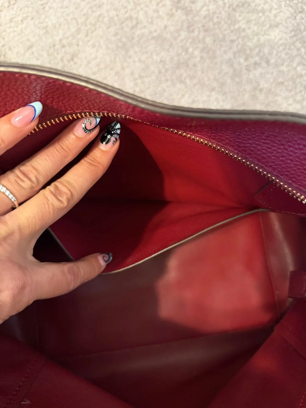 Michael Kors Wine Red Pebbled Leather Tote with Gold Logo Charm